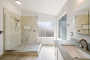 Bathroom Remodeling In Phoenix Arizona Modern Walk-In Shower With Glass Enclosure In A Bright Bathroom.