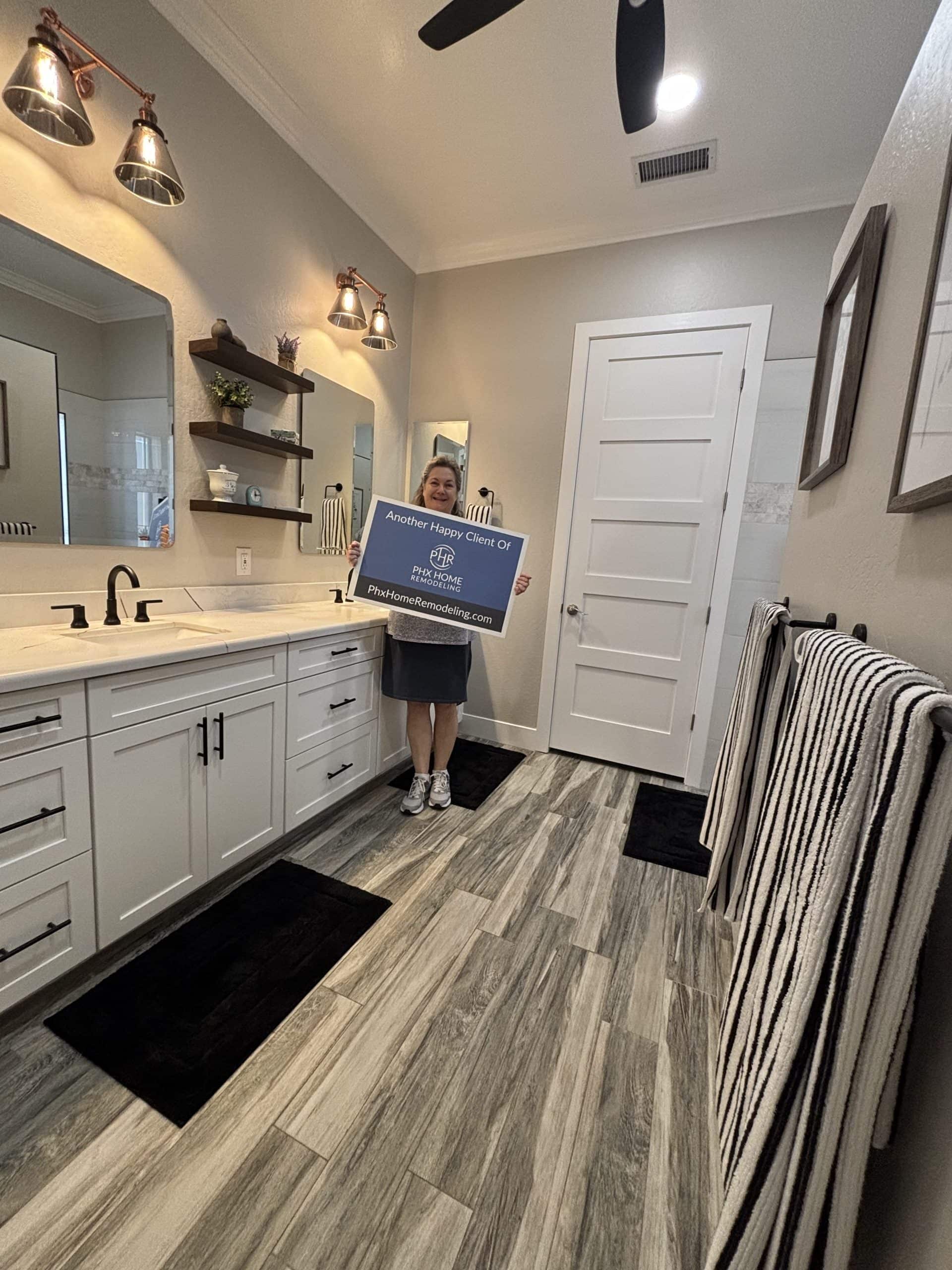Homeowner holding sign Homeowner holding sign